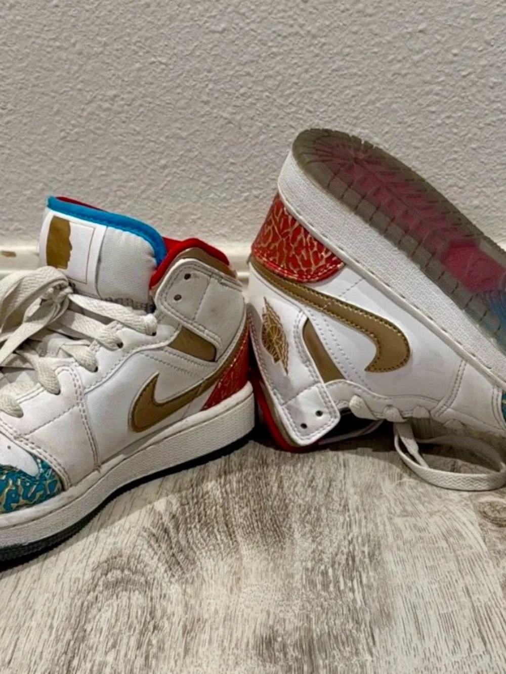 Jordan Kids White High-Top Sneakers with Gold, Teal & Red Accents